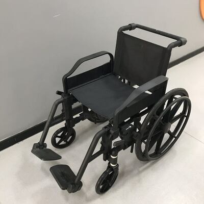 Folded universal wheels featuring removable padded armrest designed for ergonomic movement of carts trolleys and equipment